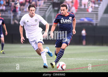 Boston, Massachusetts, USA. 17th June, 2015. Charlotte Independence midfielder Paolo DelPiccolo (36) and New England Revolution defender Kevin Alston (30) in game action during the US Open Cup fourth round between the New England Revolution and the Charlotte Independence held at Harvard's Soldiers Field Soccer Stadium. The Independence defeated the Revolution 1-0. Eric Canha/CSM/Alamy Live News Stock Photo