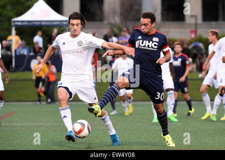 Boston, Massachusetts, USA. 17th June, 2015. New England Revolution defender Kevin Alston (30) and Charlotte Independence midfielder Paolo DelPiccolo (36) battle for control of the ball during the US Open Cup fourth round between the New England Revolution and the Charlotte Independence held at Harvard's Soldiers Field Soccer Stadium. The Independence defeated the Revolution 1-0. Eric Canha/CSM/Alamy Live News Stock Photo