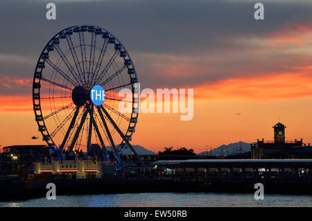 Hong Kong observation wheel and the IFC2 building, Victoria harbor, Hong Kong, China. Stock Photo