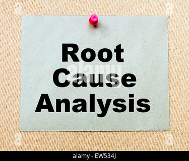 Root Cause Analysis written on paper note pinned with red thumbtack on wooden board. Business conceptual Image Stock Photo