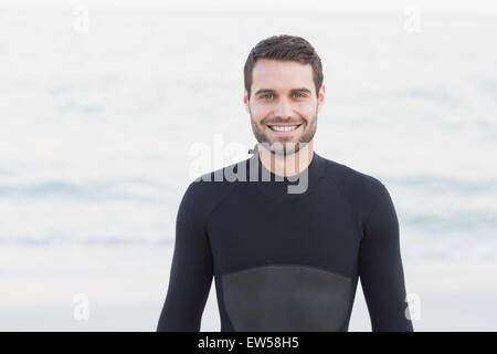 Man in wetsuit on a sunny day Stock Photo