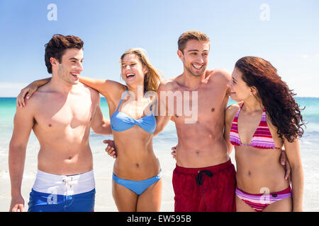 Happy friends having fun beside the water Stock Photo