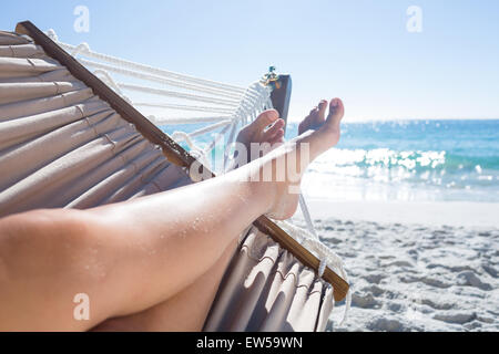 Woman relaxing in the hammock Stock Photo