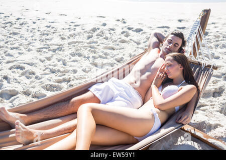 Happy couple napping together in the hammock Stock Photo