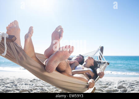 Happy couple napping together in the hammock Stock Photo