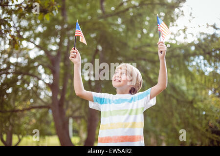 Young boy holding an american flag Stock Photo