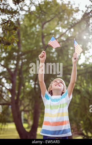 Young boy holding an american flag Stock Photo