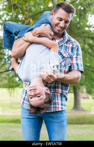 Father and son having fun in the park Stock Photo