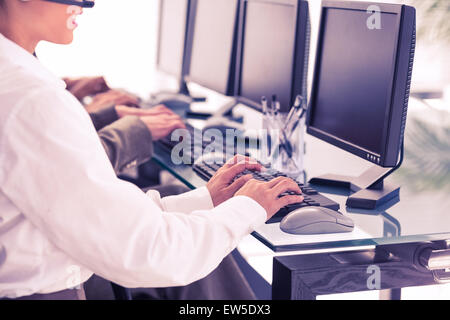 Business people using computers Stock Photo