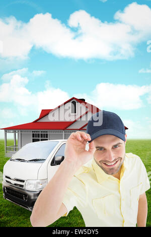 Composite image of handsome delivery man wearing baseball cap Stock Photo