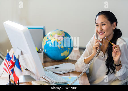 Pretty businesswoman having phone call Stock Photo