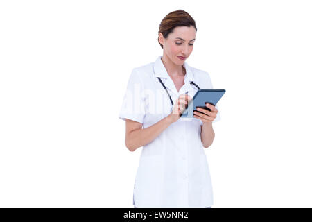 Confident doctor using tablet Stock Photo