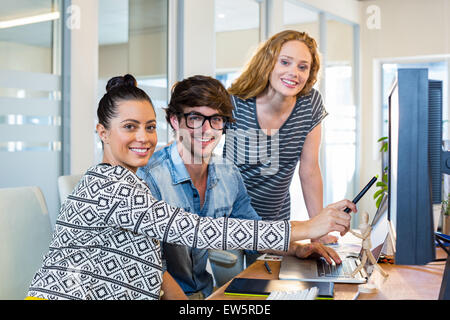 Professional designers working on computer Stock Photo