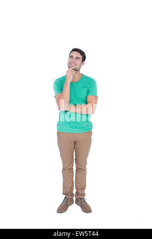 Handsome man thinking with hand on chin Stock Photo