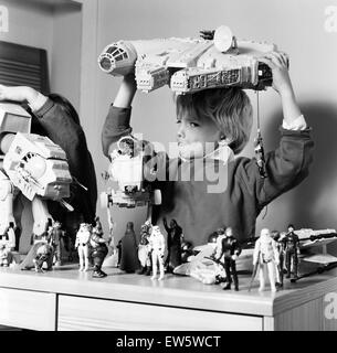 Two boys, Thomas (dark hair) and Robbin playing with their Star Wars toys. 16th November 1983. Stock Photo