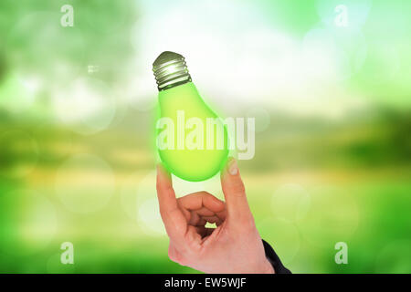 Composite image of businessman measuring something with his fingers Stock Photo