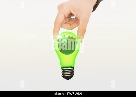 Composite image of businessman measuring something with his fingers Stock Photo