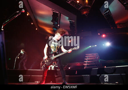 Metallica in concert at the NEC Arena, Birmingham. Jason Newsted, bass guitarist with the band. 4th November 1992. Stock Photo