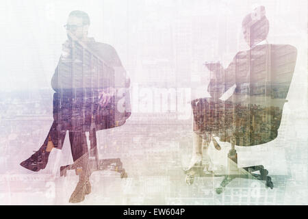 Composite image of thoughtful businessman sitting on a swivel chair Stock Photo