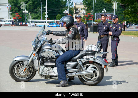 Prayer for the Day of memory and grief, beginning of the WW II. First in Kaliningrad procession on motorcycles and priest Stock Photo