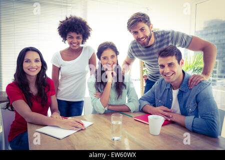 Portrait of a smiling business team looking at the camera Stock Photo