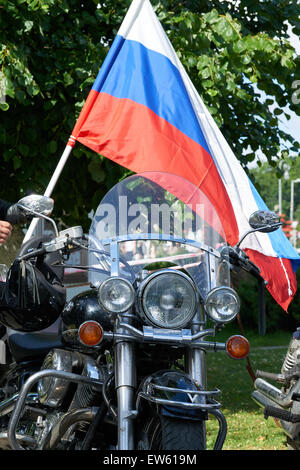 Prayer for the Day of memory and grief, beginning of the WW II. First in Kaliningrad procession on motorcycles and priest Stock Photo