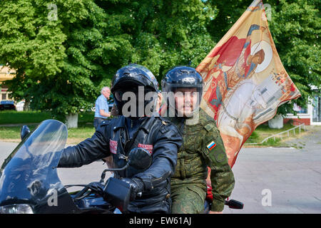 Prayer for the Day of memory and grief, beginning of the WW II. First in Kaliningrad procession on motorcycles and priest Stock Photo