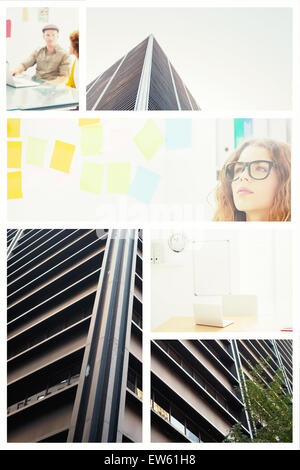 Composite image of concentrated artist looking at colorful sticky notes Stock Photo