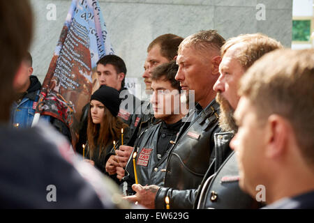 Prayer for the Day of memory and grief, beginning of the WW II. First in Kaliningrad procession on motorcycles and priest Stock Photo