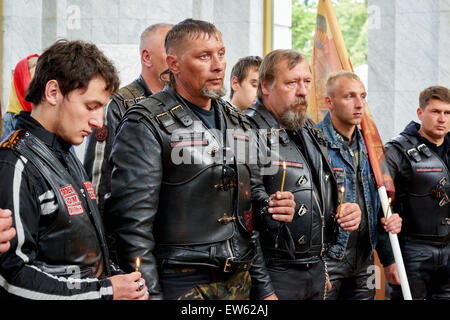 Prayer for the Day of memory and grief, beginning of the WW II. First in Kaliningrad procession on motorcycles and priest Stock Photo