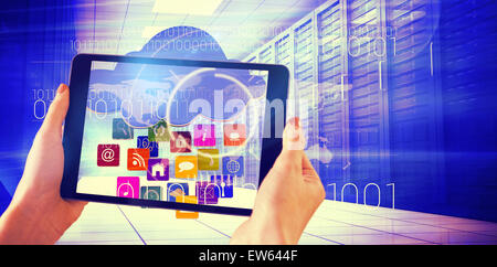 Composite image of finger pointing to tablet Stock Photo