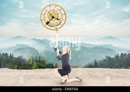 Composite image of businesswoman pulling a chain Stock Photo