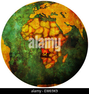 angola territory with flag on map of globe Stock Photo