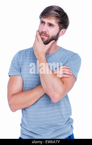 Handsome man thinking with hand on chin Stock Photo