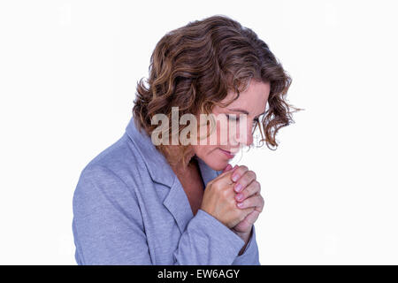 Pretty brunette woman praying Stock Photo