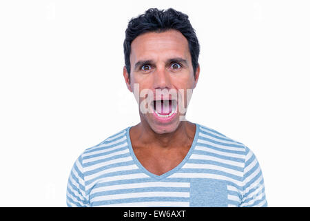 Shocked man looking at camera Stock Photo