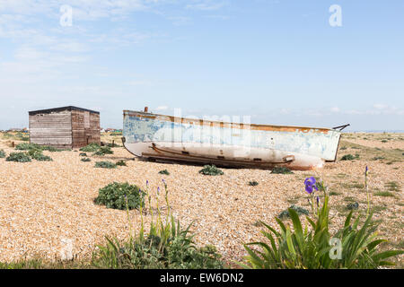 Abandoned fishing boat on the Kent beach at Dungeness Stock Photo