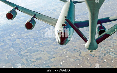 Oct. 10, 2013 - USAF KC-135R.The KC-135 Stratotanker provides the core aerial refueling capability for the United States Air Force and has excelled in this role for more than 50 years. This unique asset enhances the Air Force's capability to accomplish its primary mission of global reach. It also provides aerial refueling support to Air Force, Navy, Marine Corps and allied nation aircraft. The KC-135 is also capable of transporting litter and ambulatory patients using patient support pallets during aeromedical evacuations.Features.Four turbofans, mounted under 35-degree swept wings, power t Stock Photo