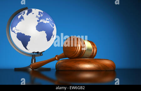 International law systems, justice, human rights and global business education concept with world map on a globe and a gavel. Stock Photo