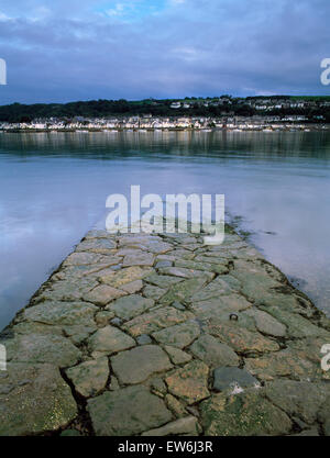 Looking across the Menai Strait to Port Dinorwic (Y Felinheli) on the mainland from Moel y Don ferry & cargo slipway, Anglesey. Stock Photo