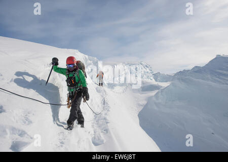 Members of the Joint Antarctic Search and Rescue Team train near crevasses on Ross Island, Antarctica. Stock Photo