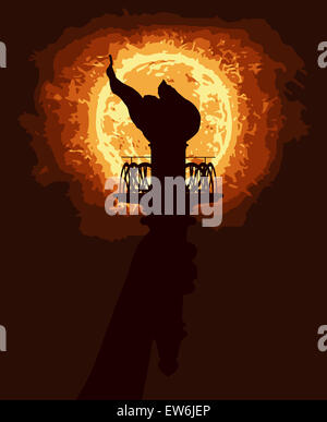 The statue of Liberty torch in silhouette with the light of the sun Stock Photo