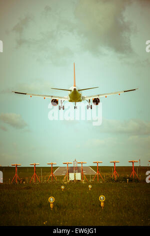 Airplane coming into land Stock Photo