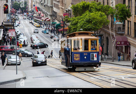 A Cable Car Going up Powell Street in Downtown San Francisco, USA Stock Photo