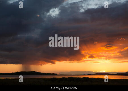 Sunset and rainclouds over Lake Kariba, Southern Africa Stock Photo