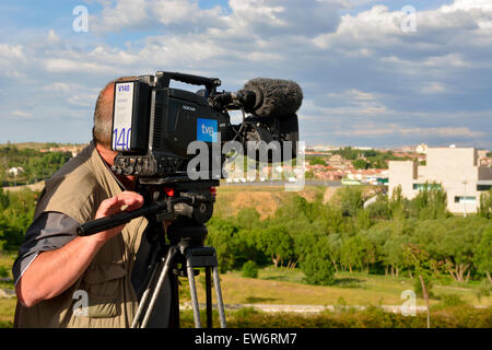 TV cameraman filming Stock Photo