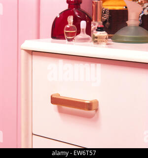 Close-up of an economy style painted chest of drawers Stock Photo