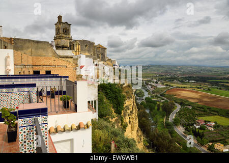 Hotel el Convento terraces at Arcos de la Frontera with Guadalete river valley and Saint Peters church Stock Photo