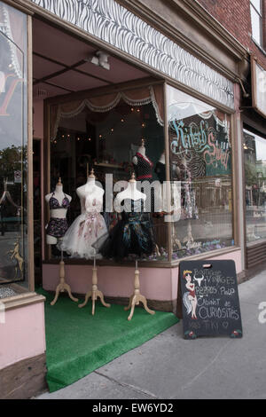 vintage dresses on display outdoor on the side of the street Stock Photo