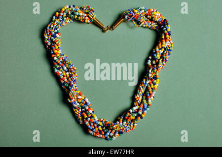 Kenyan beaded necklace in heart shape in studio setting Stock Photo